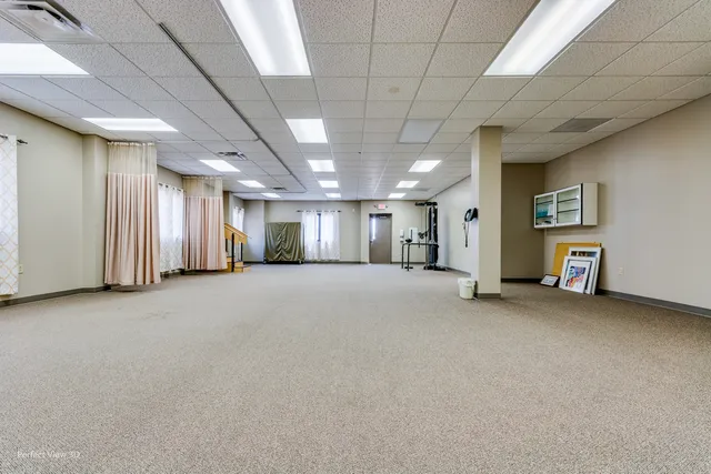 a view of a livingroom with a staircase