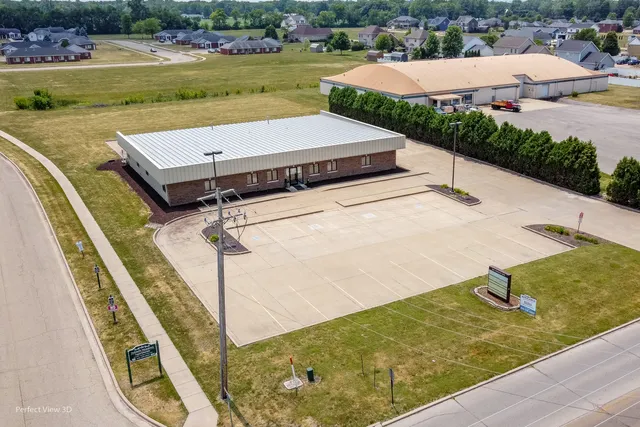 a view of a backyard with an outdoor space