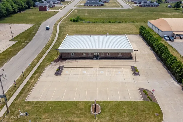 a view of swimming pool with a yard