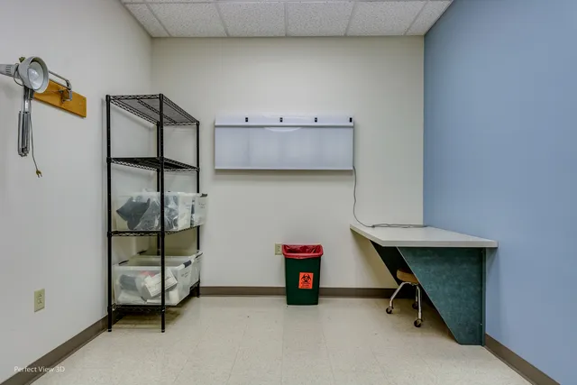 a view of room with racks on the wall