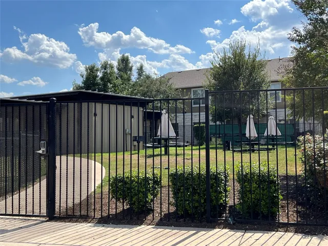 a view of a house with a garden