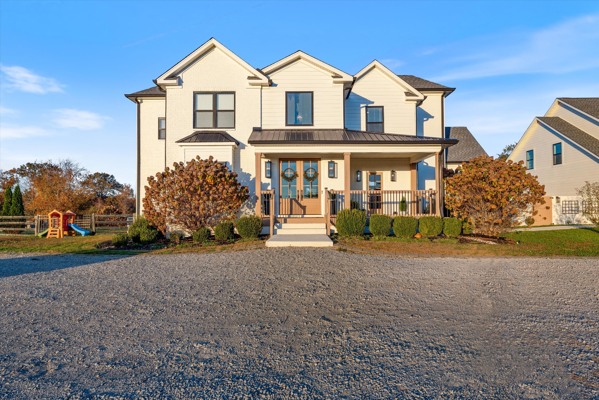 7314 Dug Hill Road Bon Aqua, TN 37025 - Photo 1 of 79 a view of a white house with a yard and plants