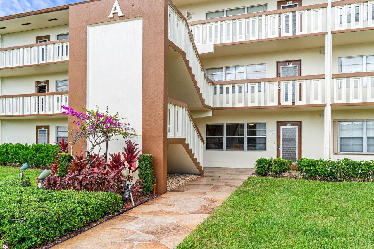 3 Mansfield B Boca Raton, FL 33434 - Photo 6 of 35 a view of a house with a garden and plants