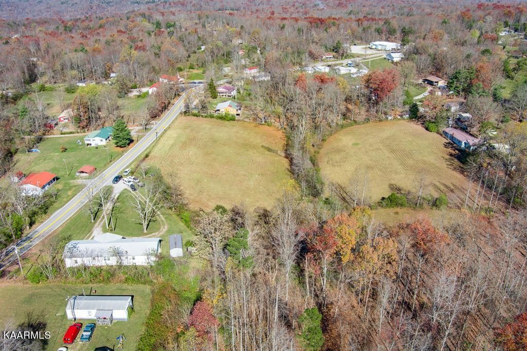 1425 West Cove Road Jamestown, TN 38556 - Photo 3 of 20 an aerial view of residential houses with outdoor space