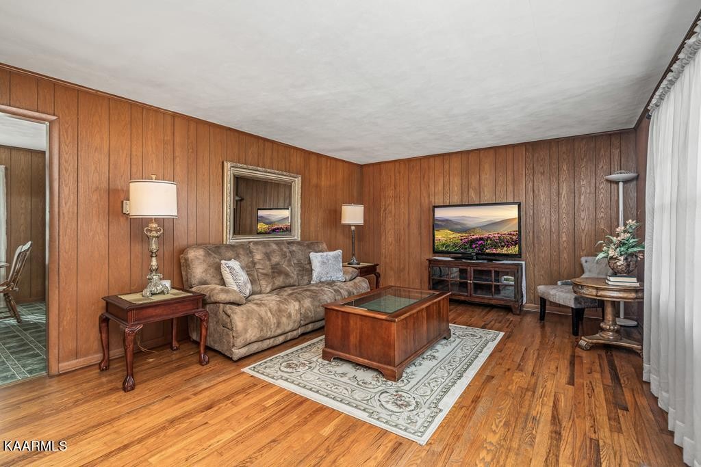 1425 West Cove Road Jamestown, TN 38556 - Photo 5 of 20 a living room with furniture and a wooden floor
