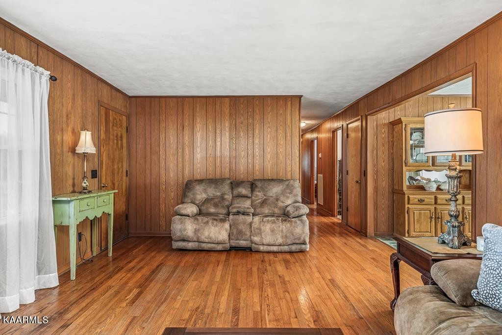 1425 West Cove Road Jamestown, TN 38556 - Photo 7 of 20 a living room with furniture and a fireplace