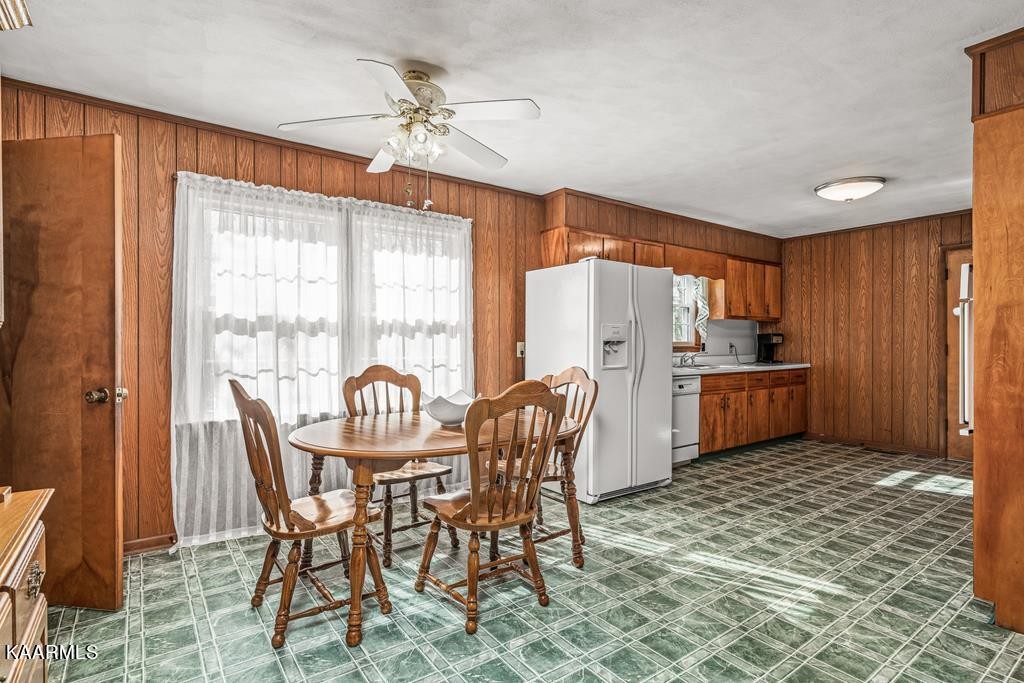 1425 West Cove Road Jamestown, TN 38556 - Photo 8 of 20 a view of a dining room with furniture and chandelier