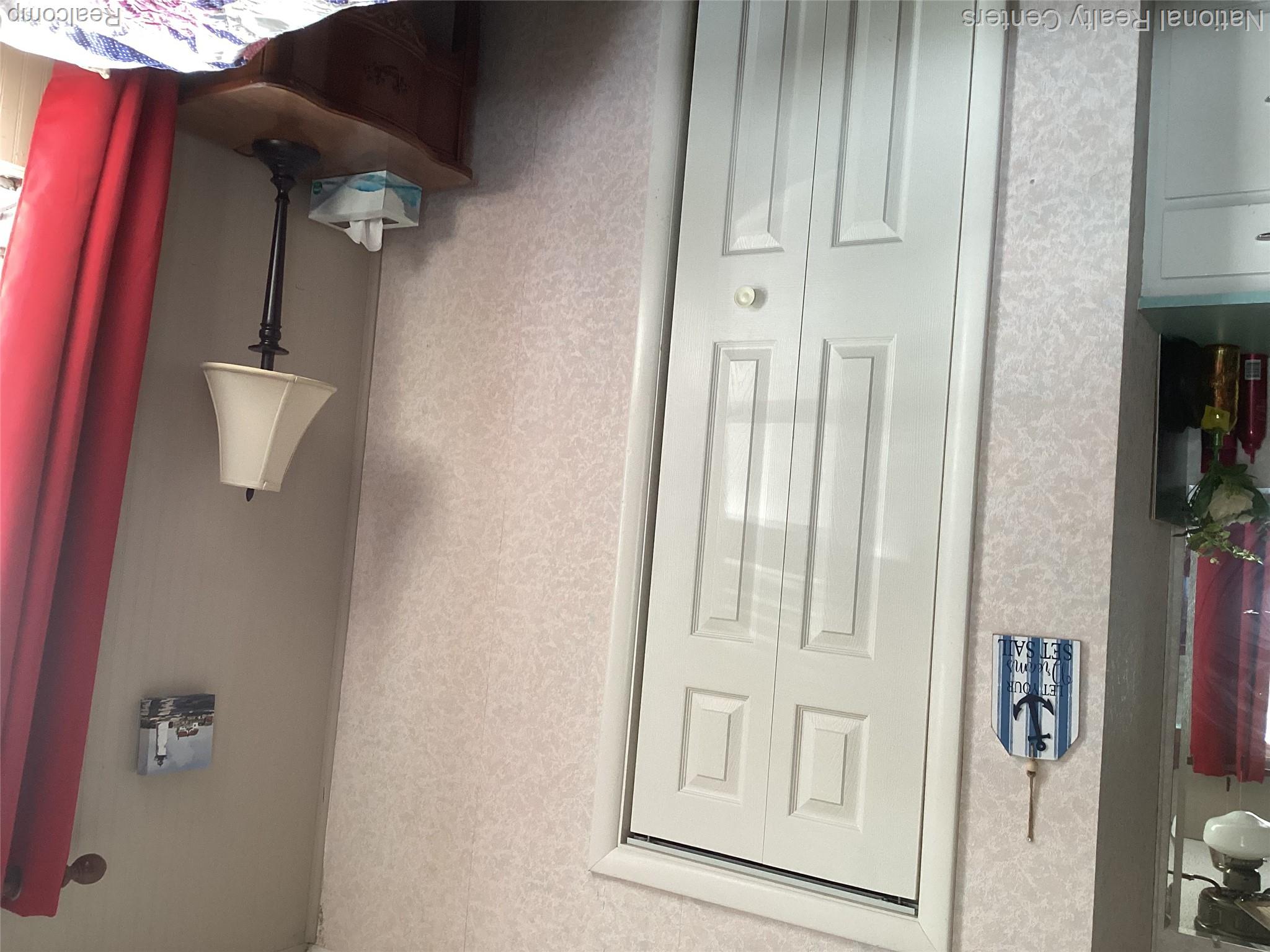 6024 Port Austin Road, Unit 5 Caseville, MI 48725 - Photo 23 of 56 closet in 2nd bedroom
