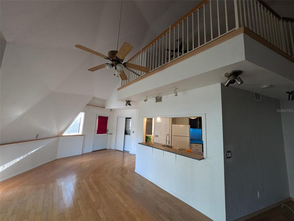 30810 Northeast 78th Street Fort McCoy, FL 32134 - Photo 6 of 9 a view of a hallway with a kitchen