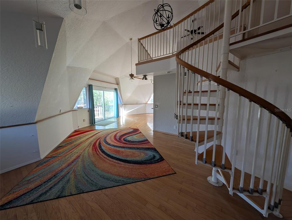 30810 Northeast 78th Street Fort McCoy, FL 32134 - Photo 8 of 9 a view of entryway and hall with wooden floor