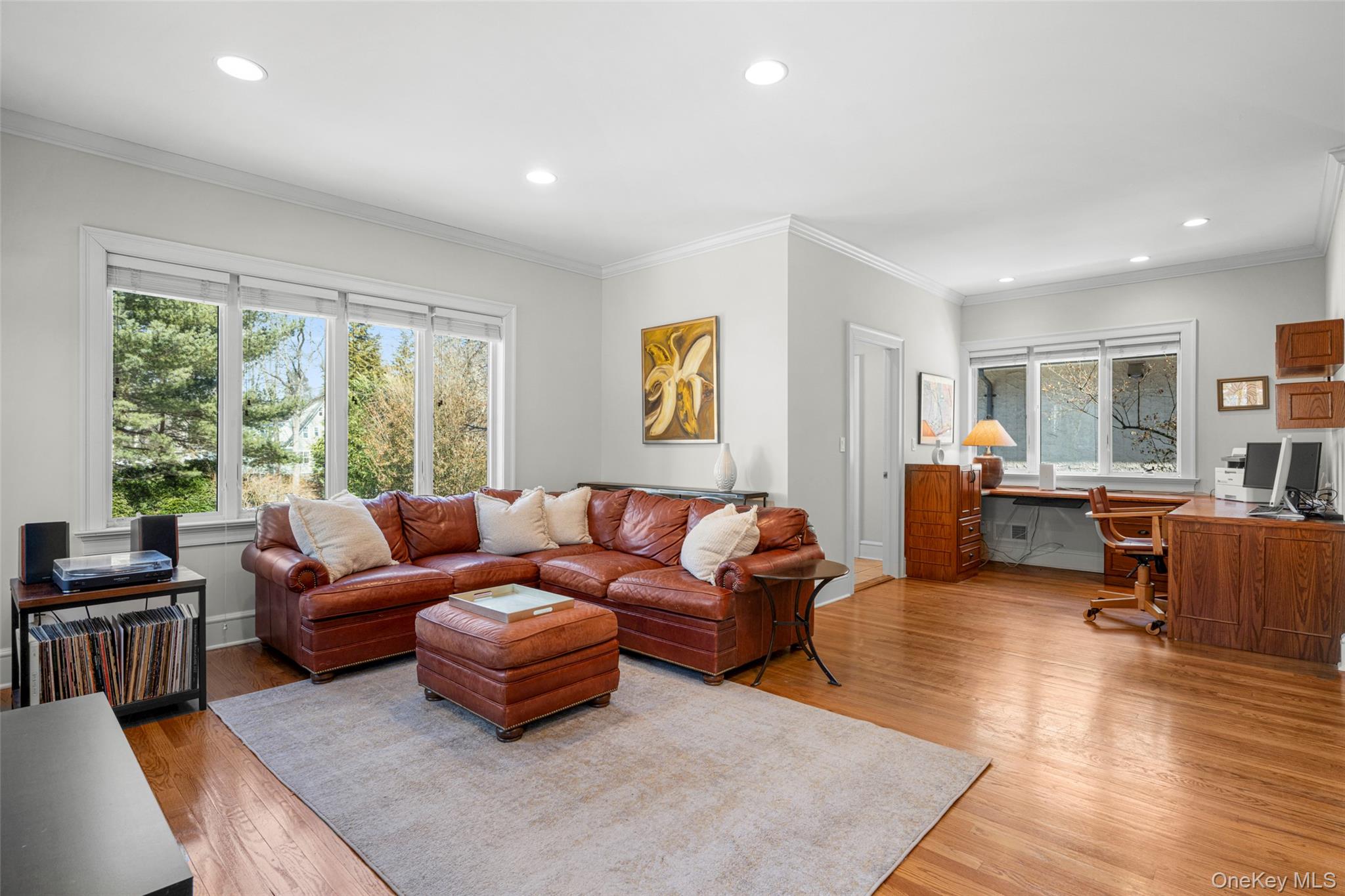 7 Poplar Road Larchmont, NY 10538 - Photo 19 of 46 a living room with furniture and a large window