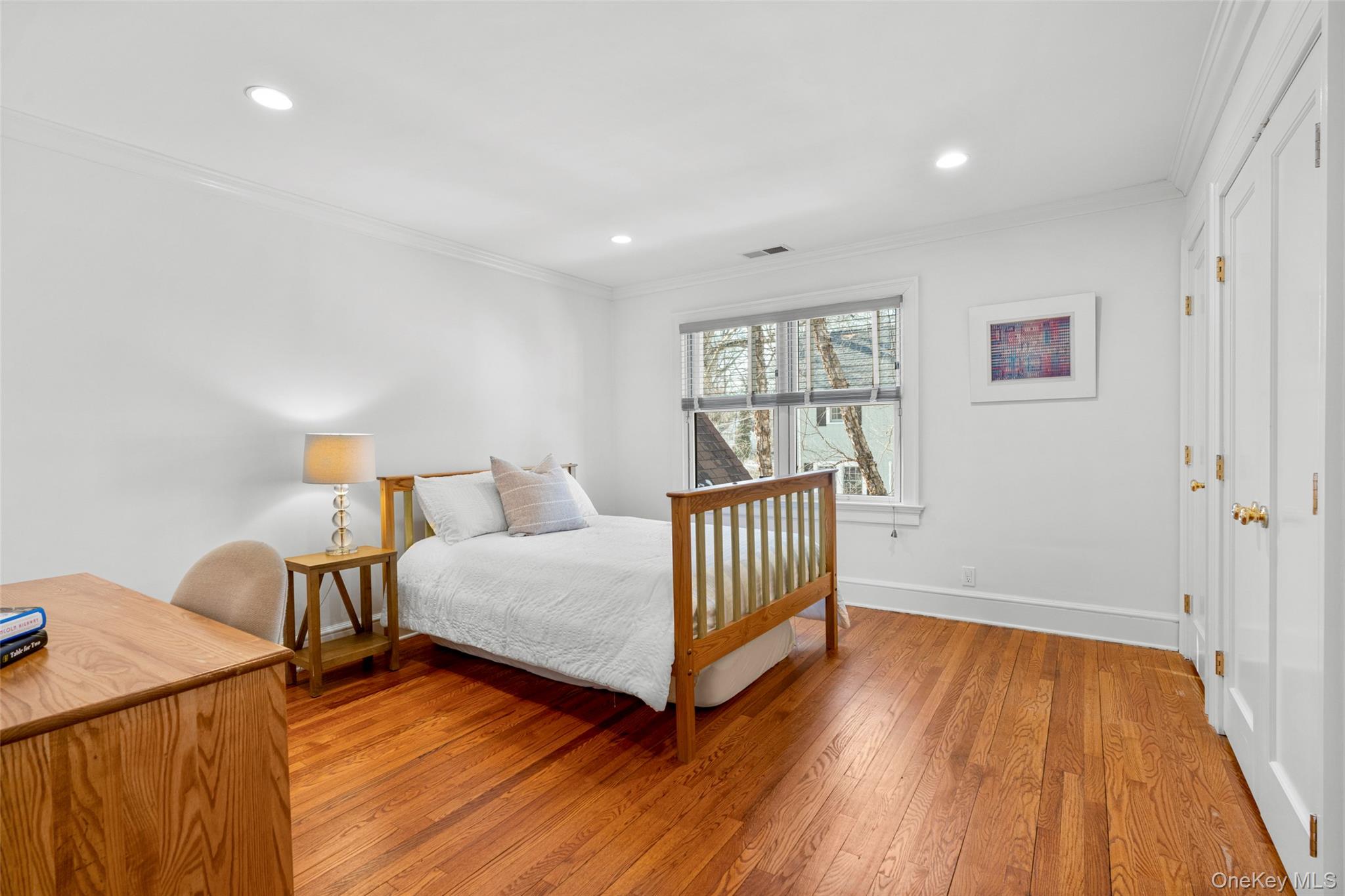7 Poplar Road Larchmont, NY 10538 - Photo 27 of 46 a view of a room with wooden floor cabinet and a window