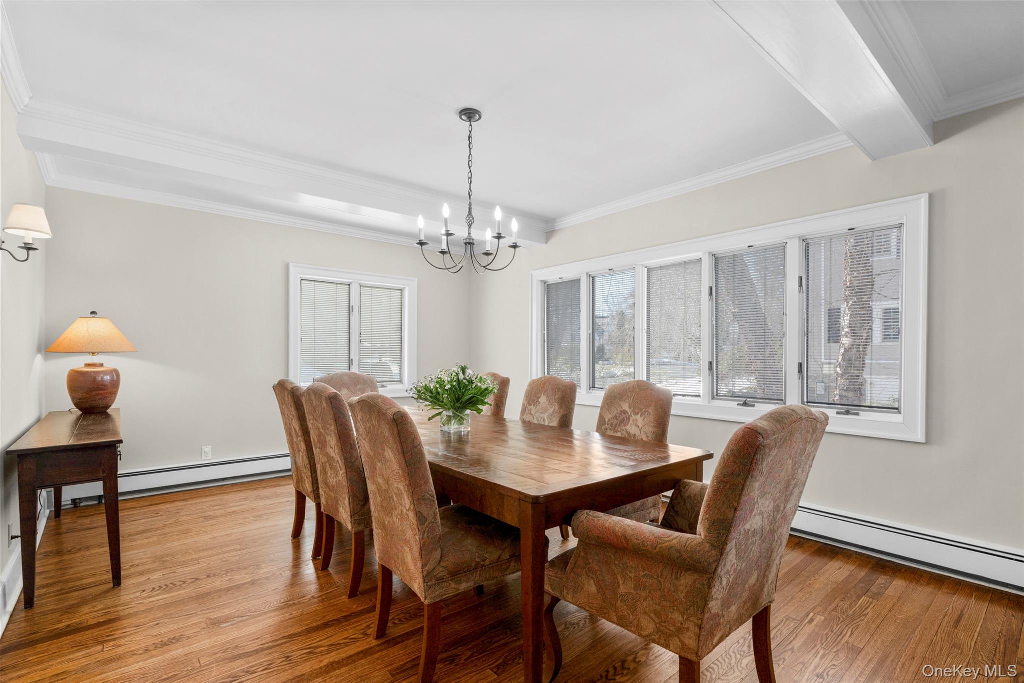 7 Poplar Road Larchmont, NY 10538 - Photo 7 of 46 a view of a dining room with furniture window and wooden floor