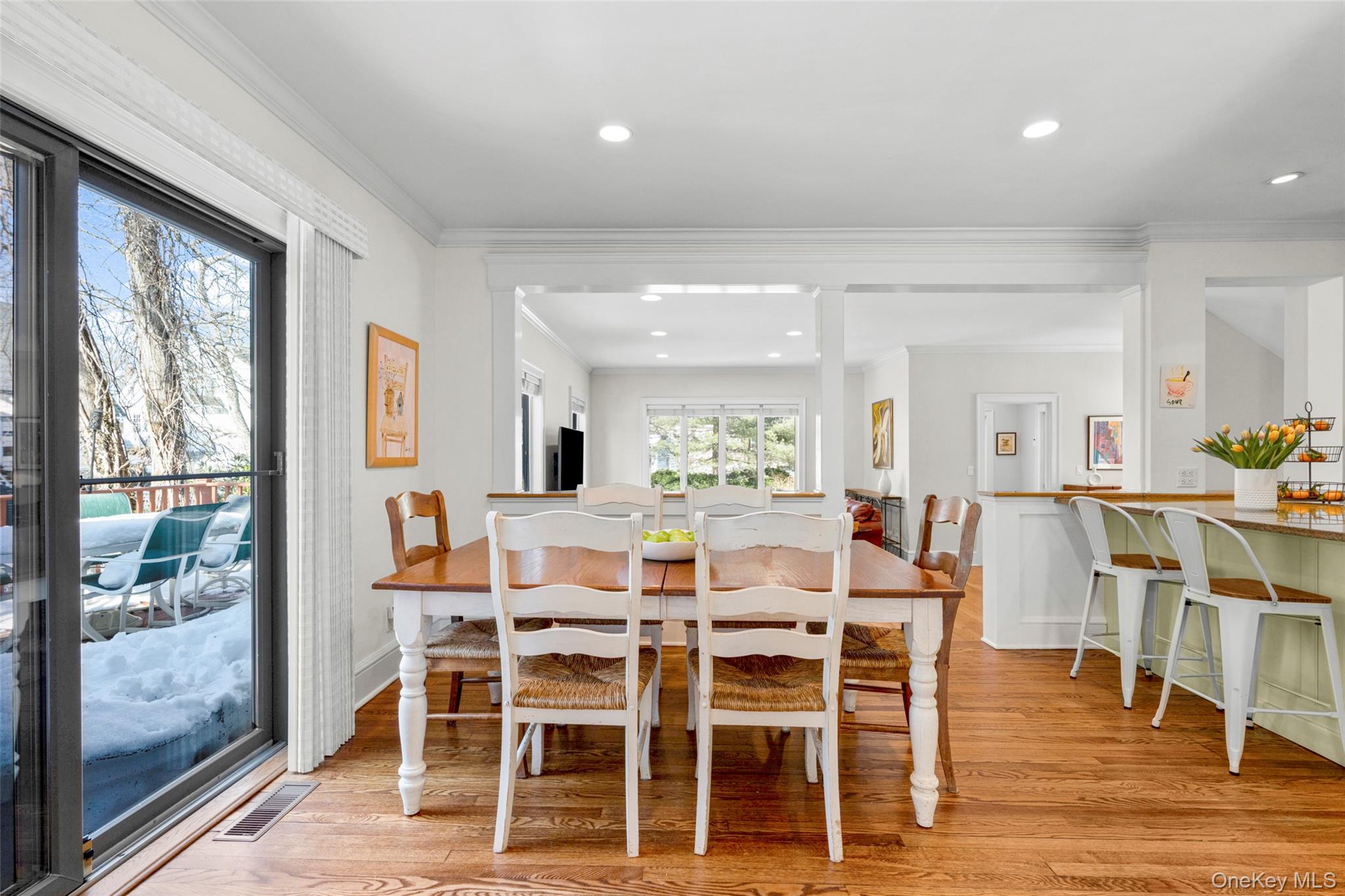 7 Poplar Road Larchmont, NY 10538 - Photo 9 of 46 a view of a dining room with furniture and wooden floor