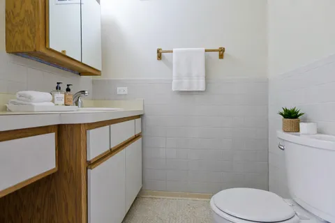 a view of balcony with furniture