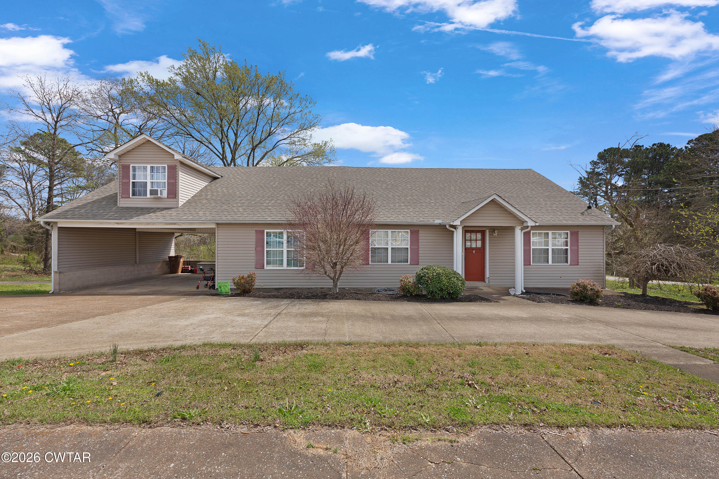 296 Broad Street North Lexington, TN 38351 - Photo 1 of 26 a front view of a house with a yard
