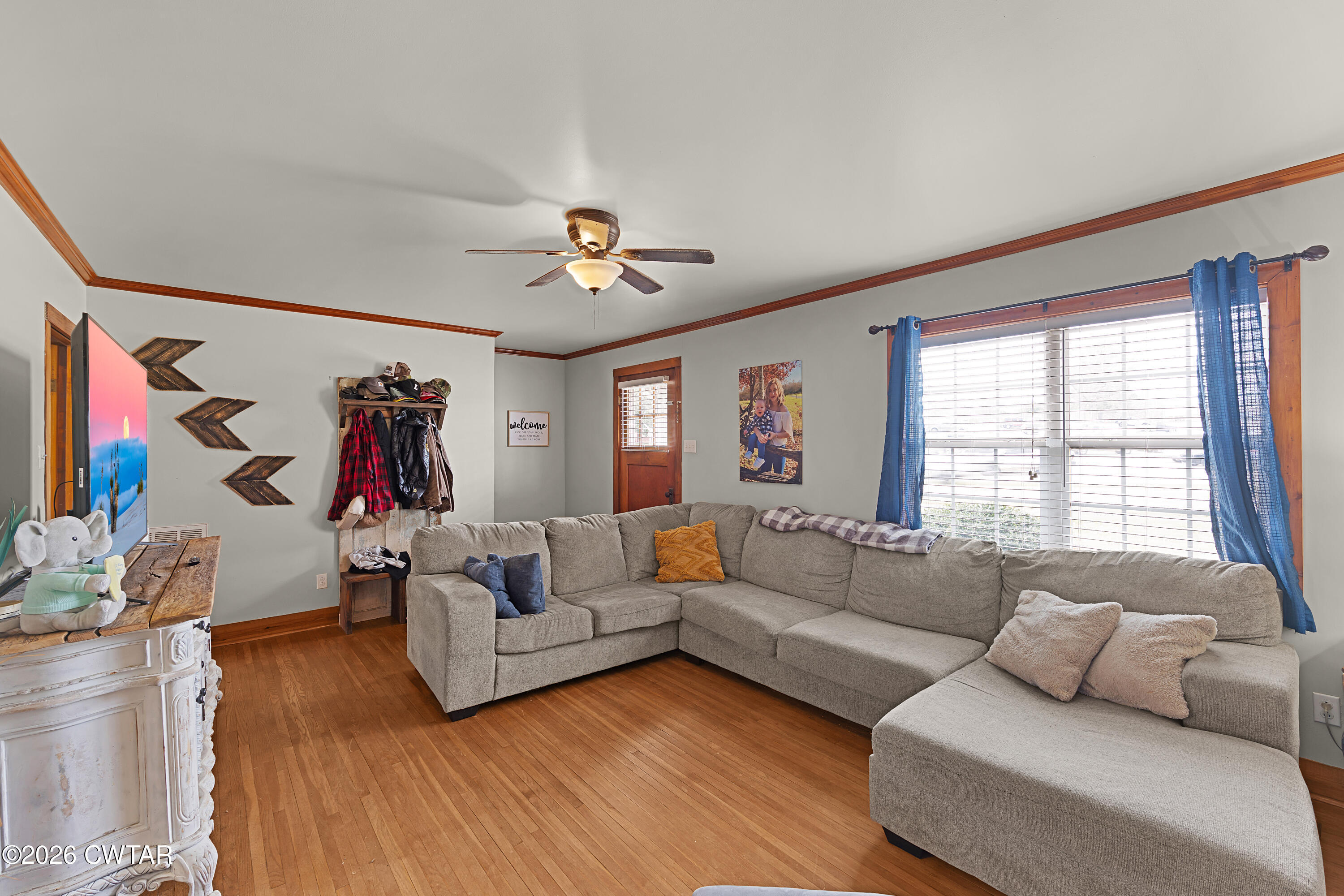 296 Broad Street North Lexington, TN 38351 - Photo 4 of 26 a living room with furniture and a large window