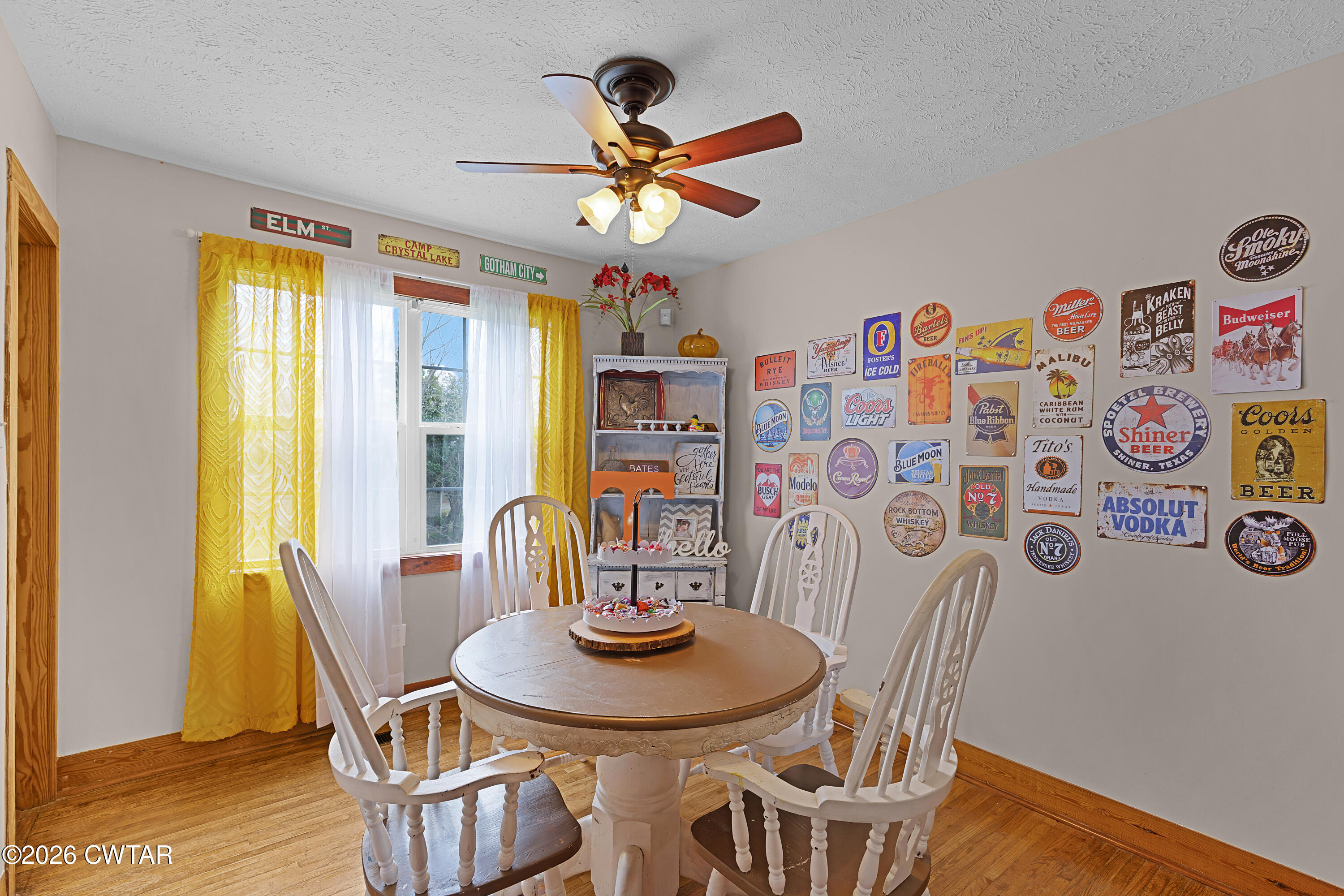 296 Broad Street North Lexington, TN 38351 - Photo 9 of 26 a view of a dining room with furniture and wooden floor