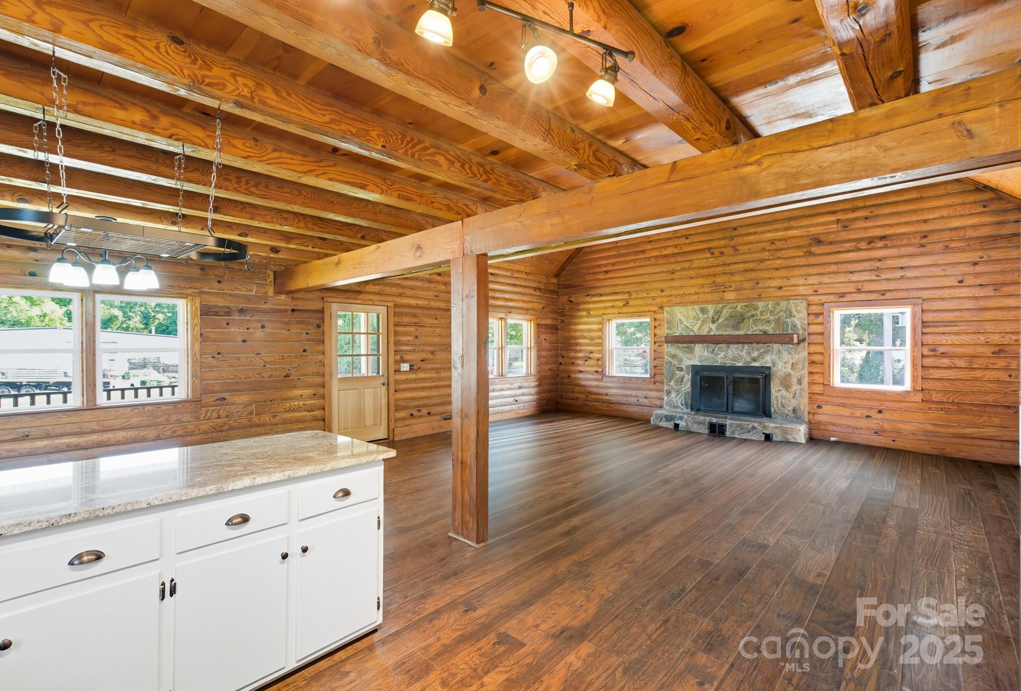 119 Yates Street Dallas, NC 28034 - Photo 15 of 47 a view of an empty room with wooden floor and a window