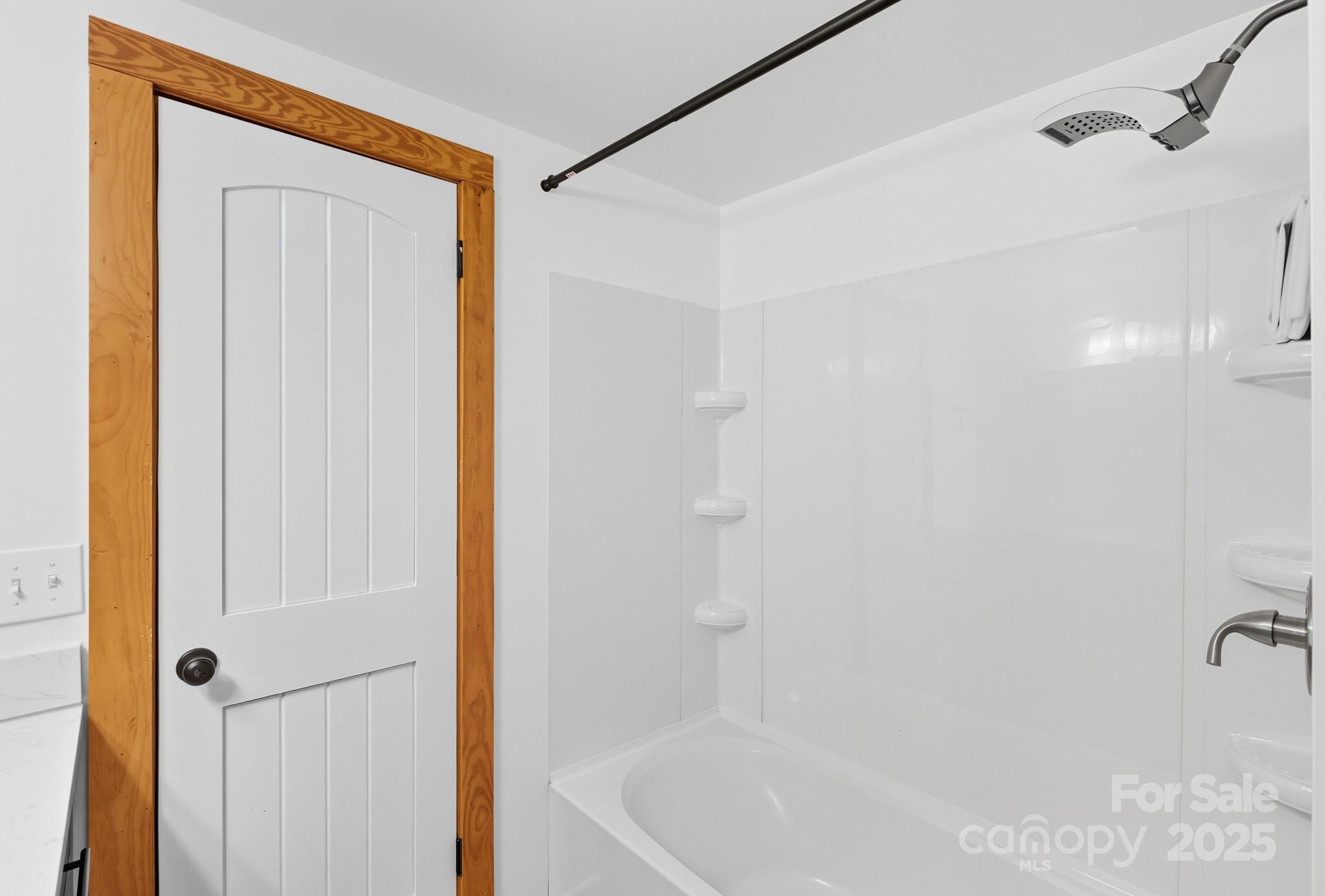 119 Yates Street Dallas, NC 28034 - Photo 25 of 47 a bathroom with a bathtub