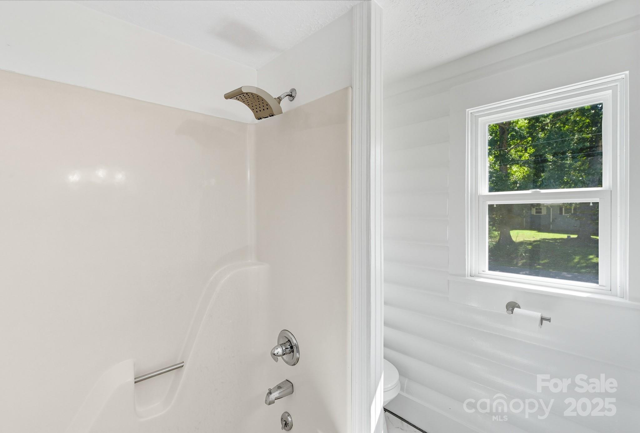 119 Yates Street Dallas, NC 28034 - Photo 37 of 47 a bathroom with a bathtub and shower