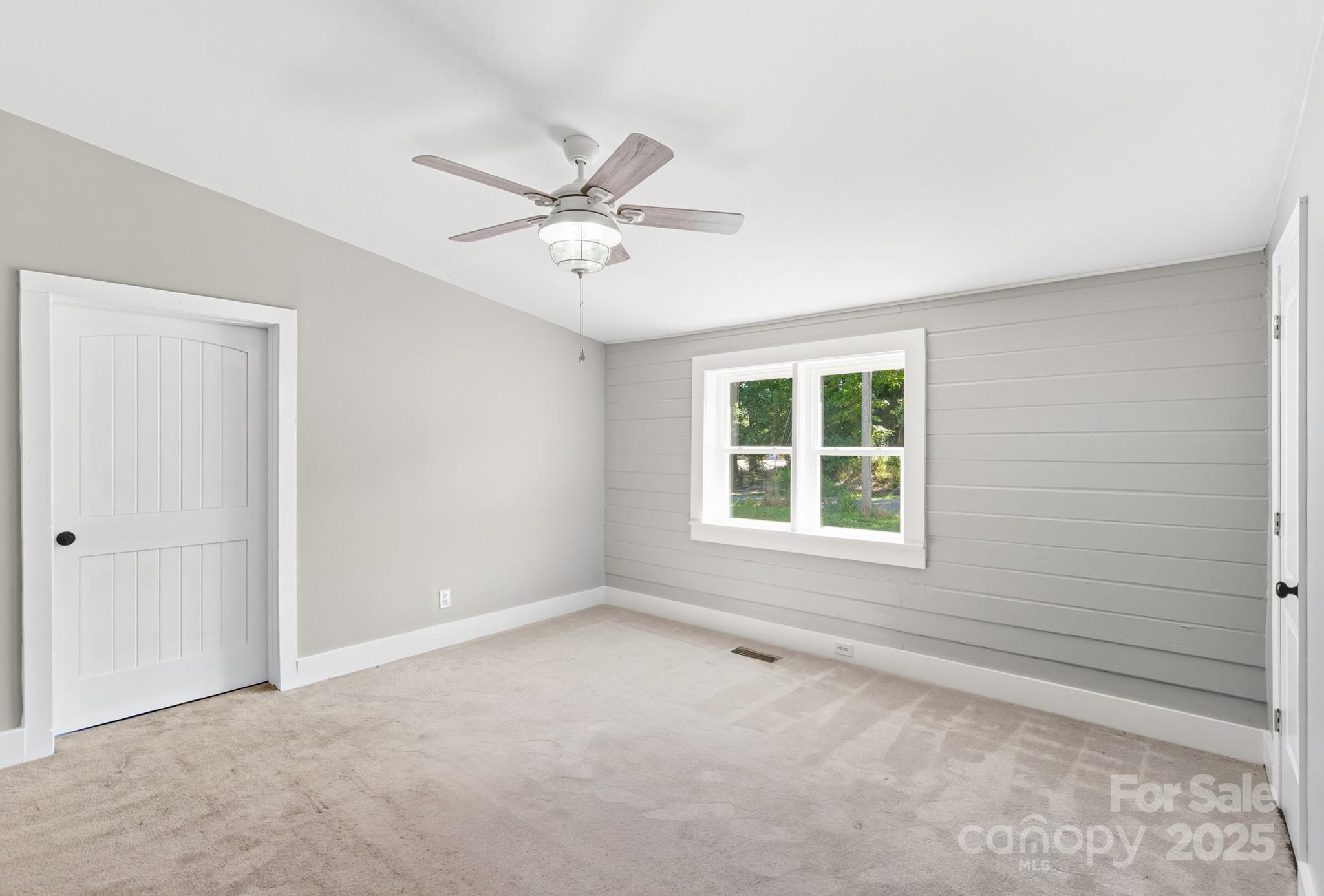 119 Yates Street Dallas, NC 28034 - Photo 39 of 47 a view of an empty room with a window