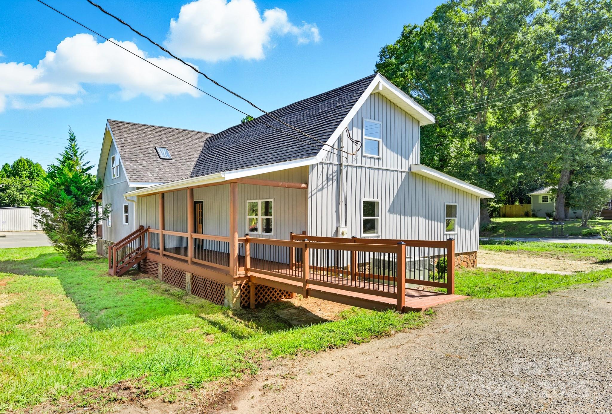 119 Yates Street Dallas, NC 28034 - Photo 42 of 47 a view of a house with a yard