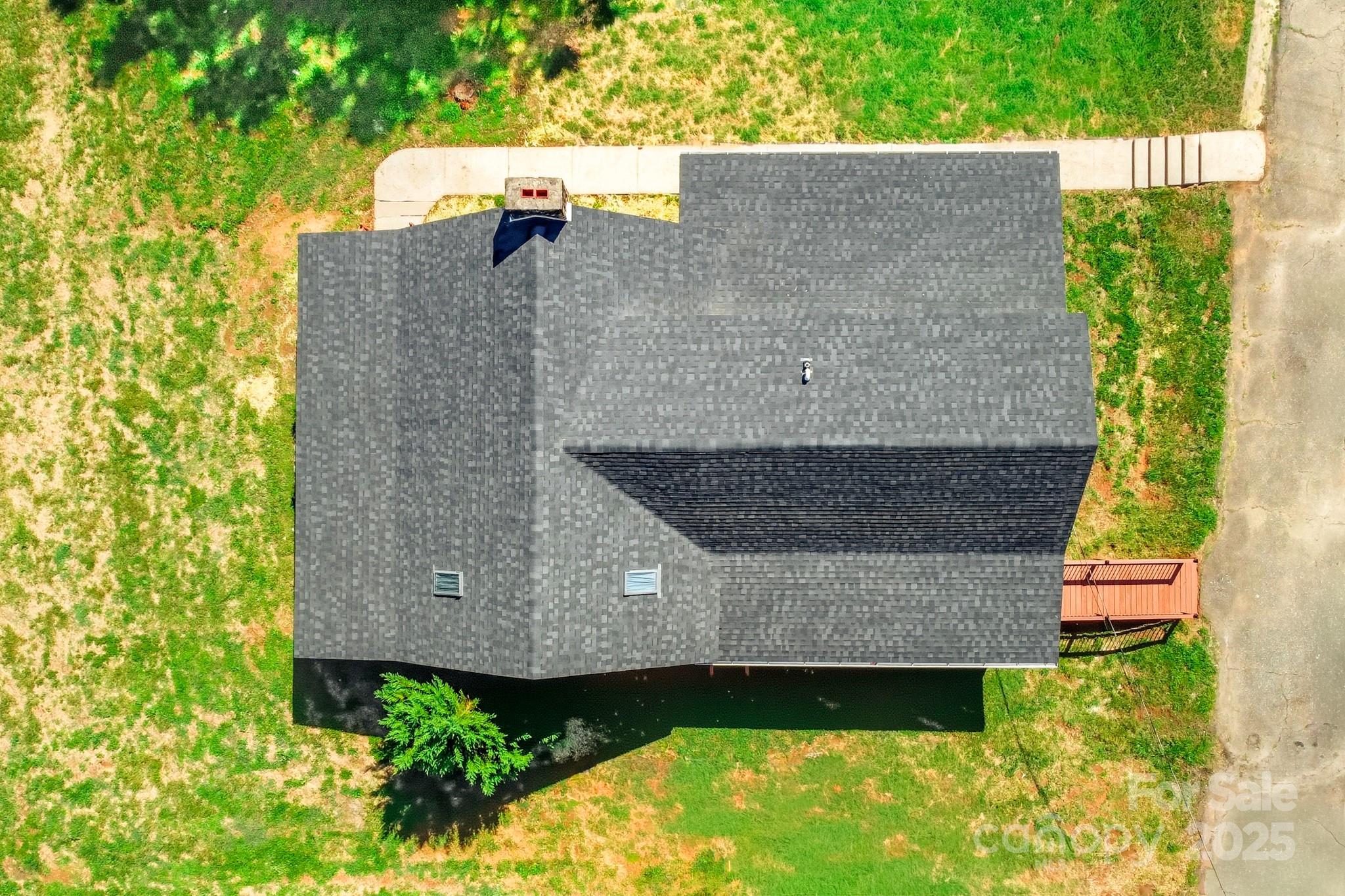 119 Yates Street Dallas, NC 28034 - Photo 46 of 47 an aerial view of a house with swimming pool and large trees