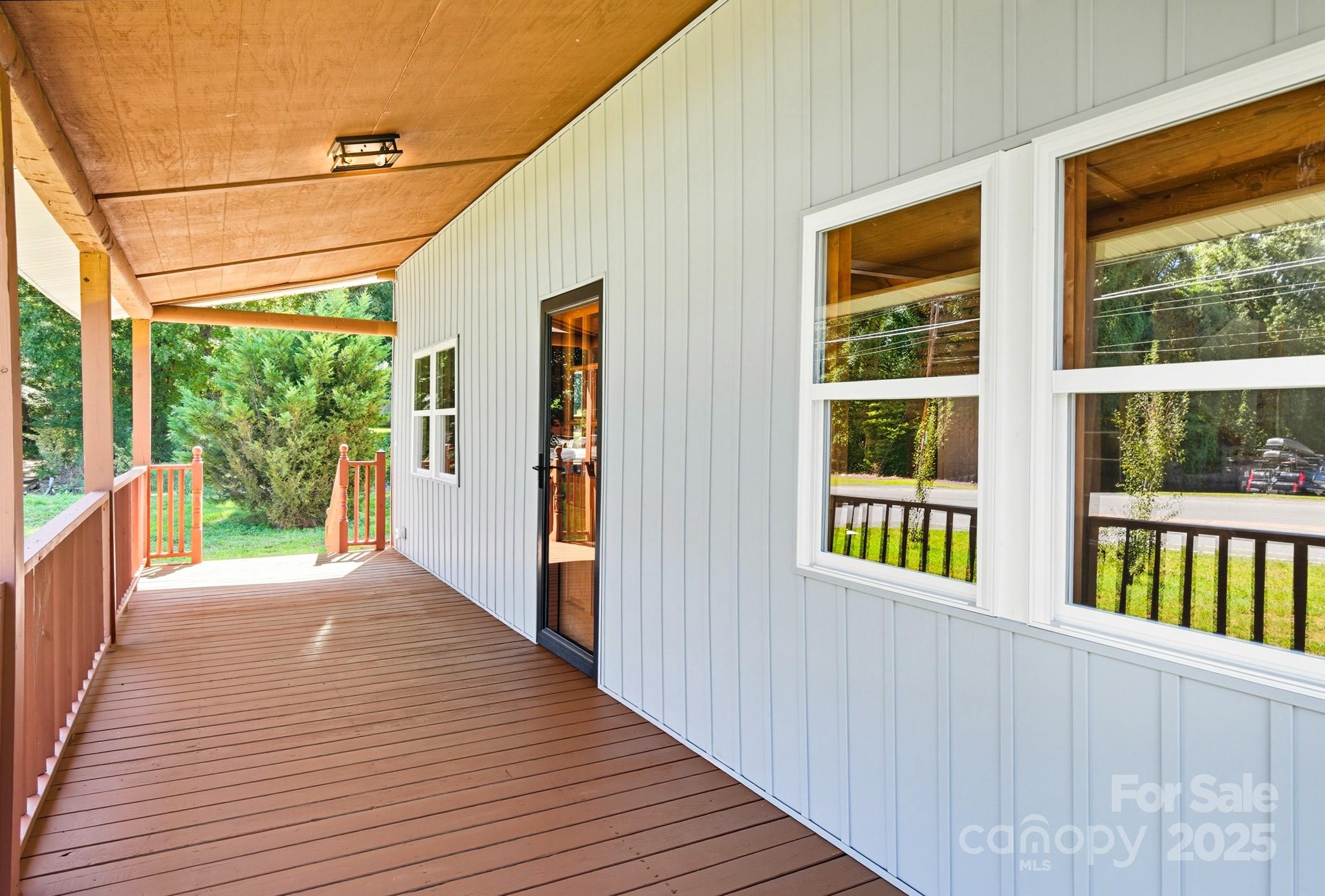 119 Yates Street Dallas, NC 28034 - Photo 5 of 47 a view of a house with porch and wooden floor