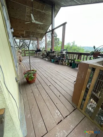 a view of roof deck with seating space