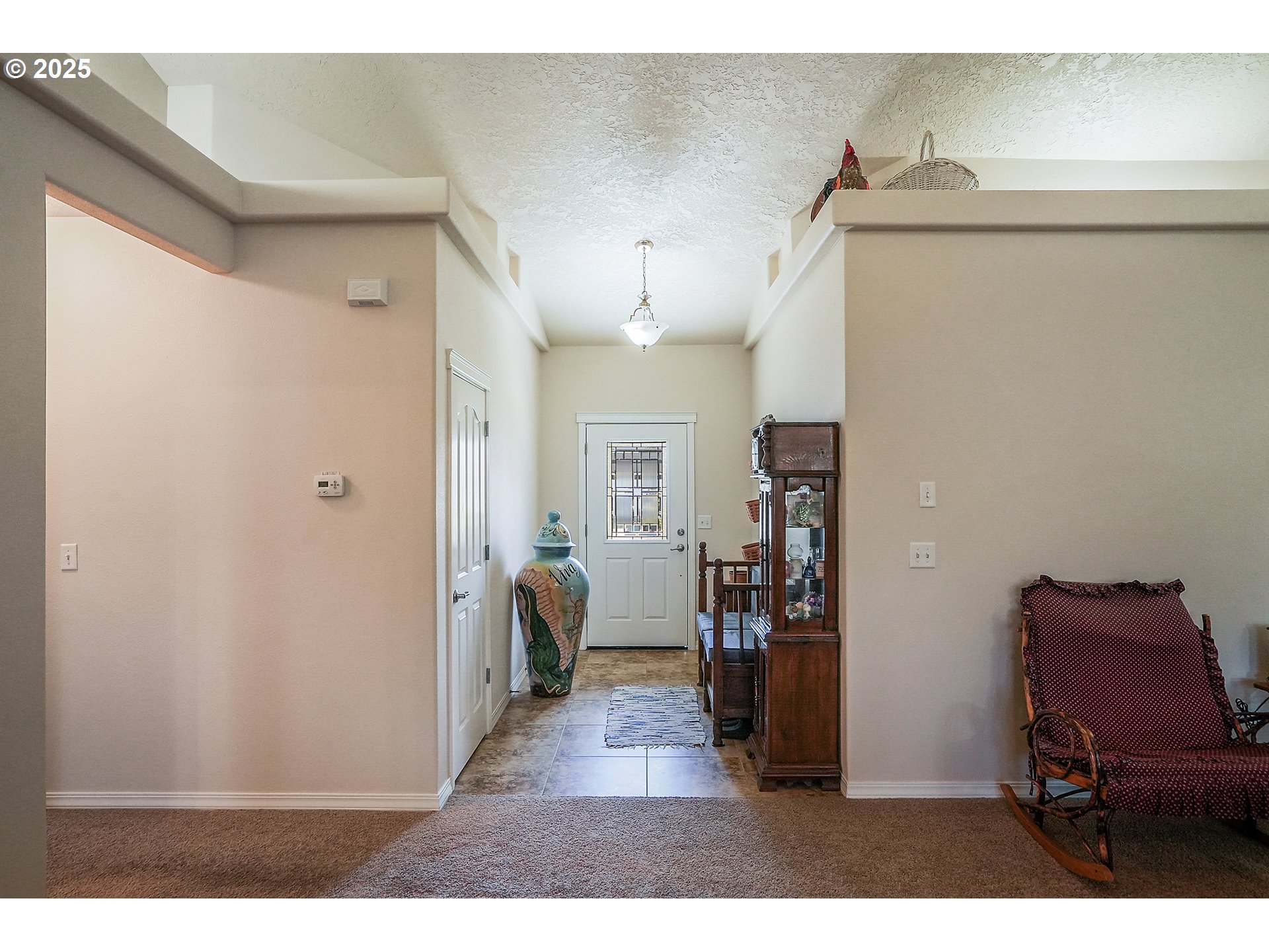 1231 Southwest 3rd Avenue Mill City, OR 97360 - Photo 16 of 48 a living room with furniture and a dresser