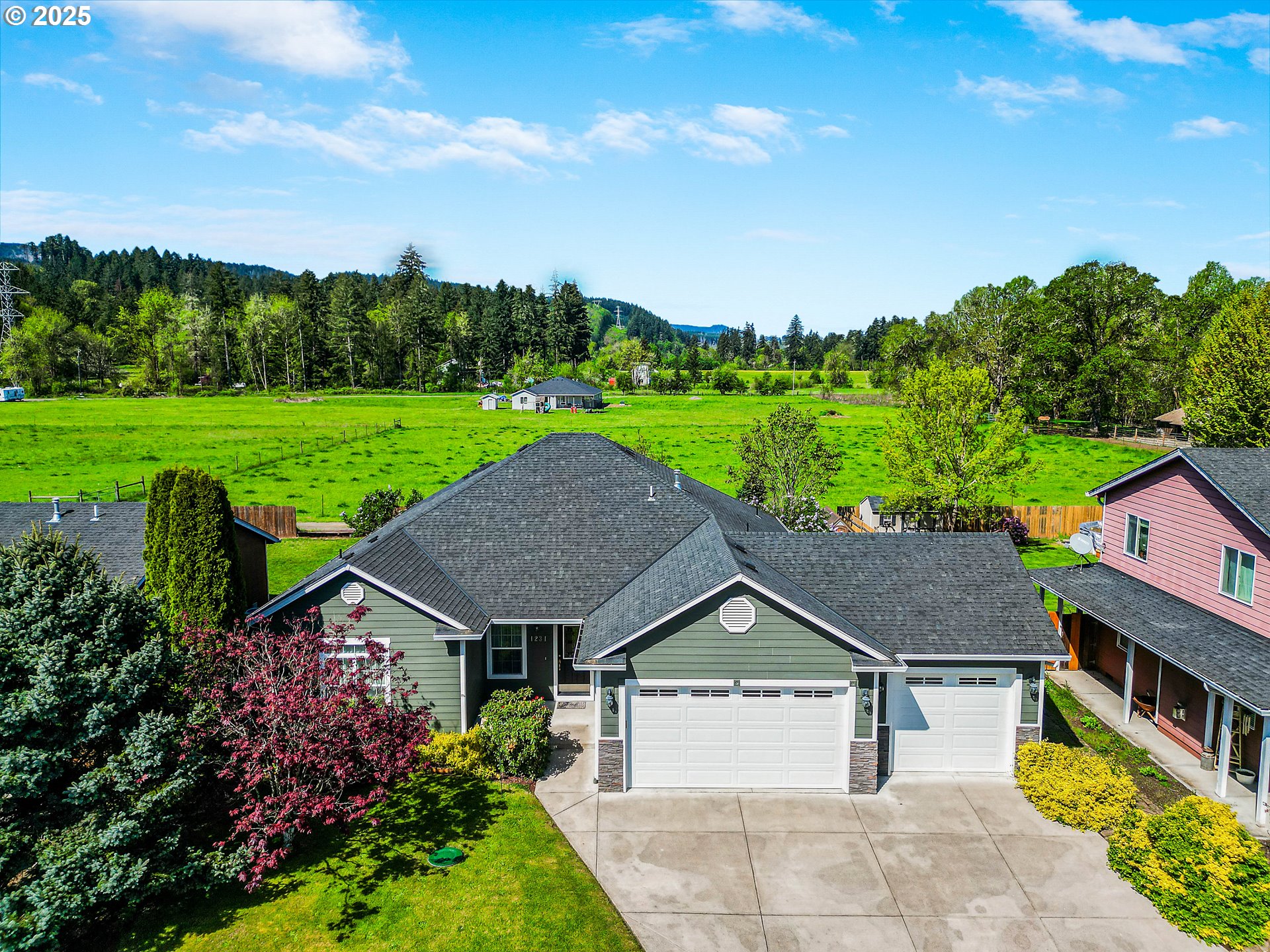 1231 Southwest 3rd Avenue Mill City, OR 97360 - Photo 2 of 48 a aerial view of a house with yard and green space