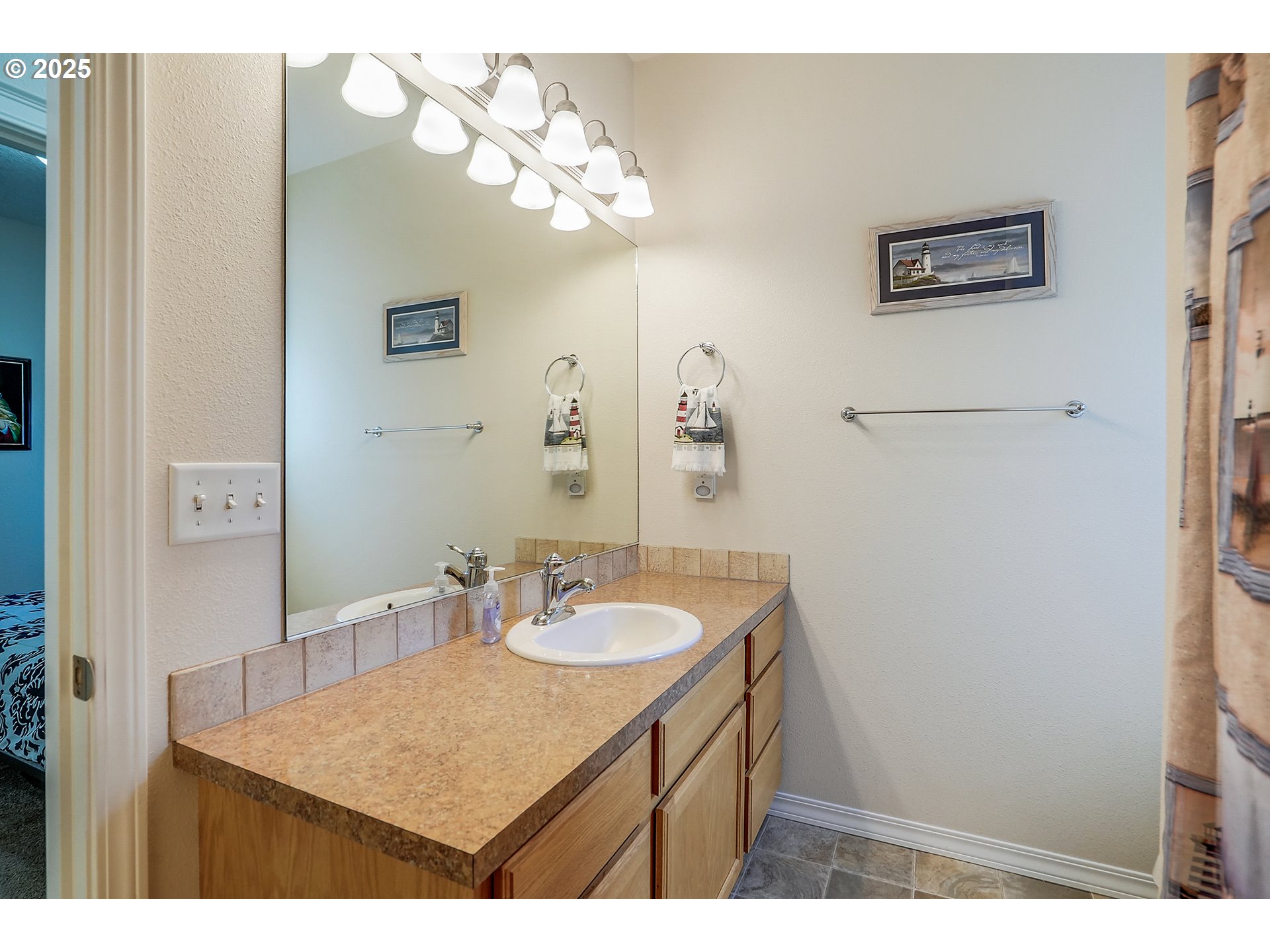 1231 Southwest 3rd Avenue Mill City, OR 97360 - Photo 23 of 48 a bathroom with a sink vanity and a mirror