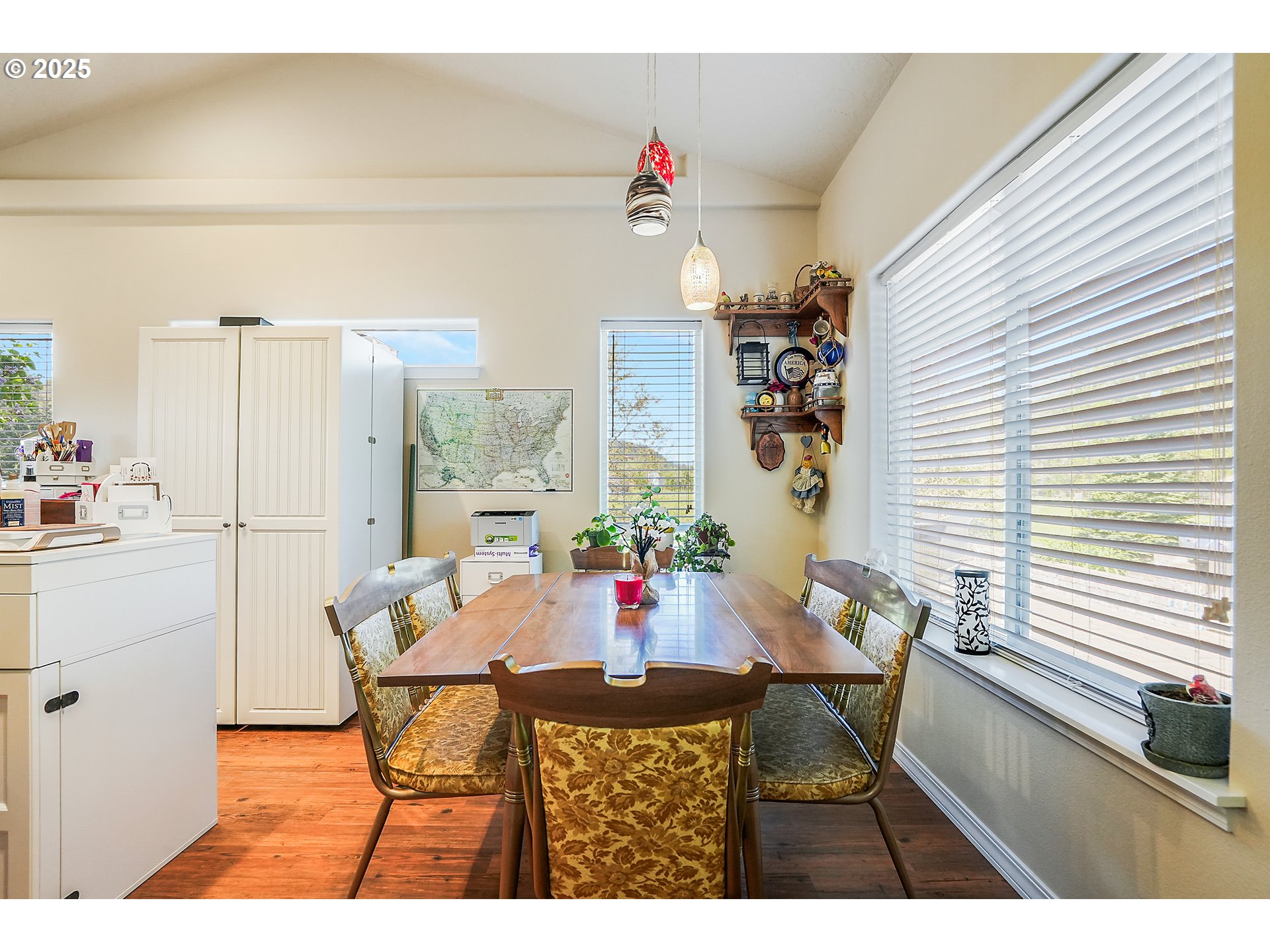1231 Southwest 3rd Avenue Mill City, OR 97360 - Photo 34 of 48 a view of a dining room with furniture and wooden floor