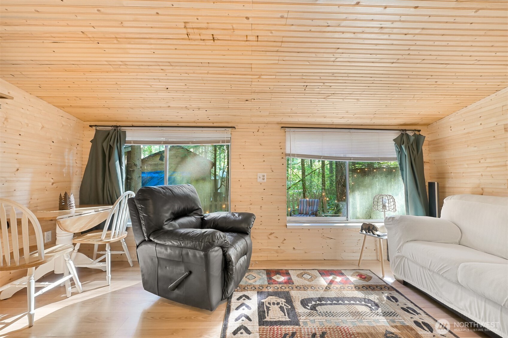 1189 Exit Road Maple Falls, WA 98266 - Photo 13 of 40 a living room with furniture and a large window