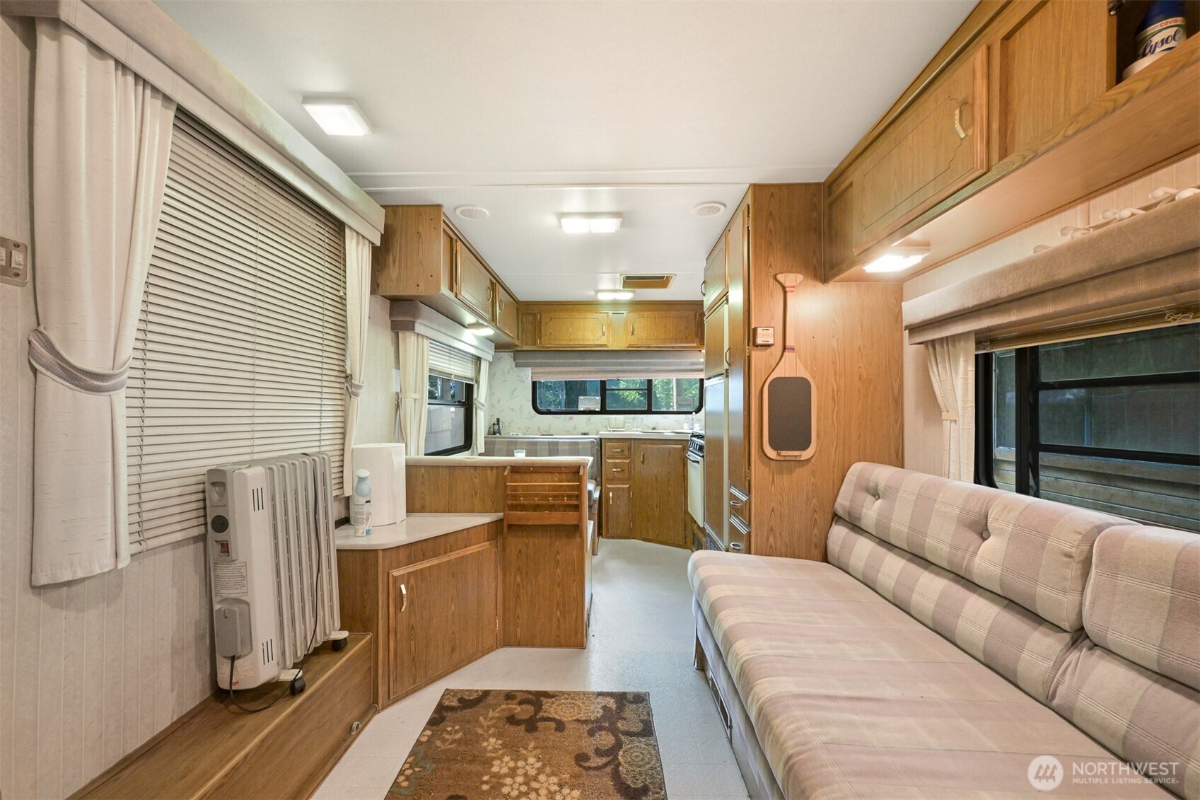 1189 Exit Road Maple Falls, WA 98266 - Photo 15 of 40 a living room with furniture and a fireplace
