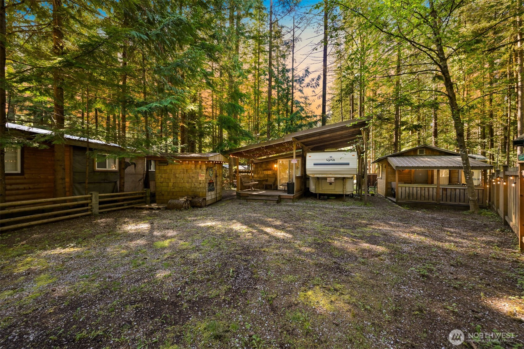 1189 Exit Road Maple Falls, WA 98266 - Photo 3 of 40 a view of a house with a yard and tree s