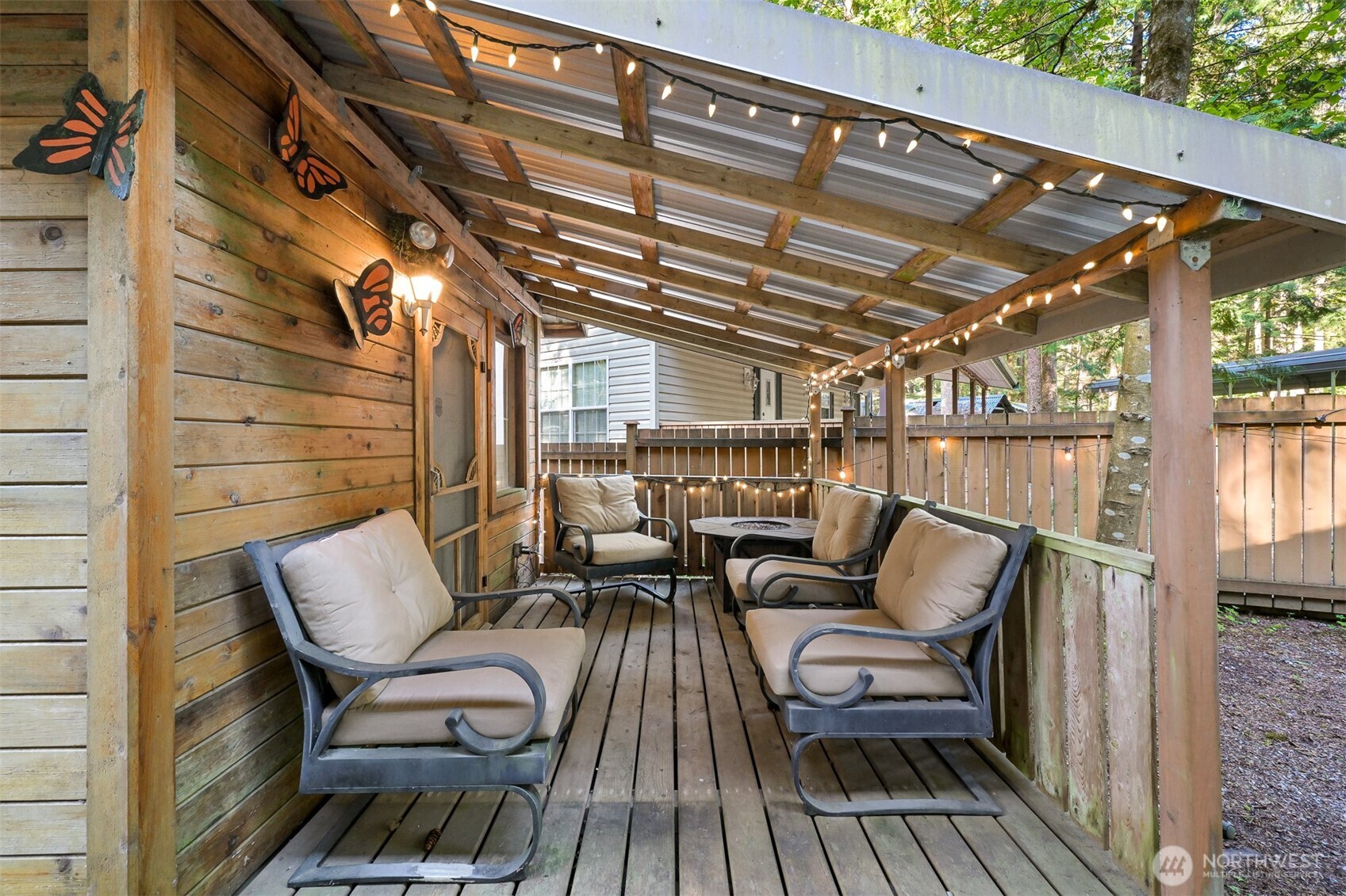 1189 Exit Road Maple Falls, WA 98266 - Photo 5 of 40 a roof deck with a table and chairs