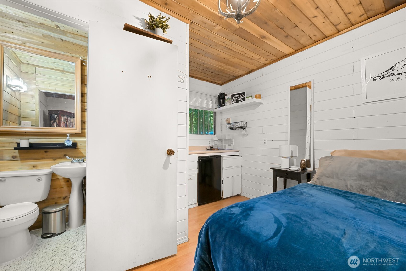 1189 Exit Road Maple Falls, WA 98266 - Photo 8 of 40 a bedroom with a bed and a view of bathroom