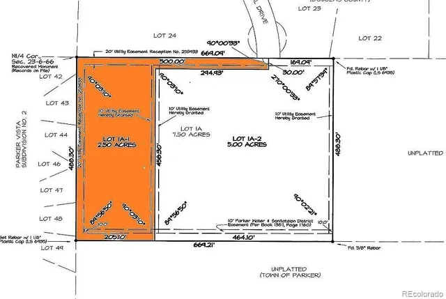 an aerial view of a houses with outdoor space
