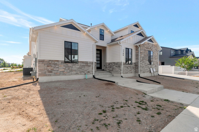 1766 South 1850th Street West, Unit MRVL08 Mapleton, UT 84664 - Photo 1 of 1 Modern exterior featuring horizontal siding and stone veneer accents
