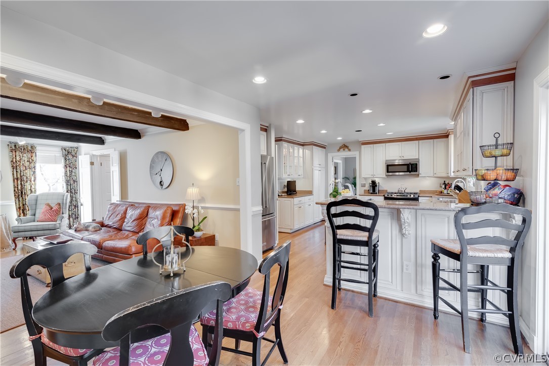 14020 Netherfield Drive Midlothian, VA 23113 - Photo 20 of 50 a view of a dining room with furniture and wooden floor