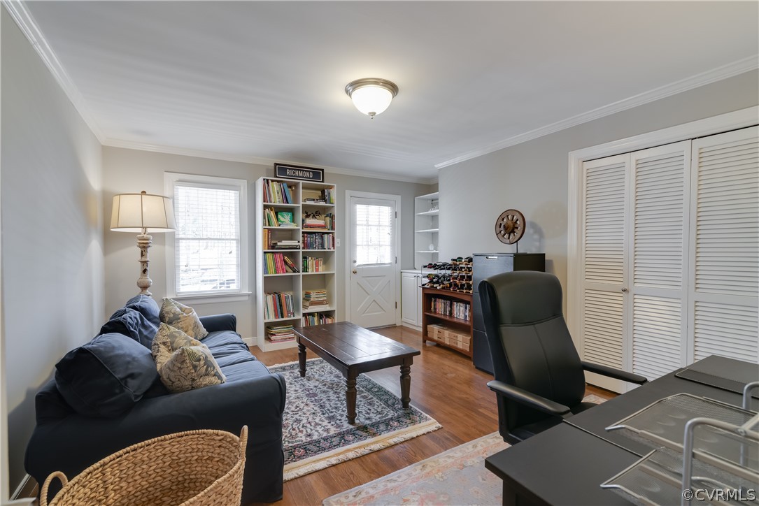 14020 Netherfield Drive Midlothian, VA 23113 - Photo 27 of 50 a living room with furniture or couch and a bookshelf