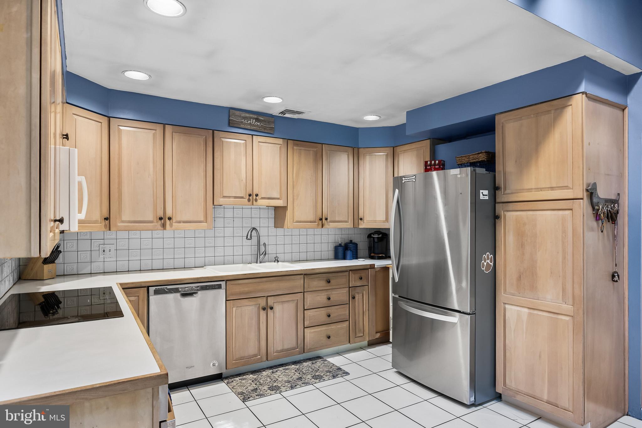 12 Greenvale Road Moorestown, NJ 08057 - Photo 13 of 49 a kitchen with stainless steel appliances a refrigerator sink and cabinets
