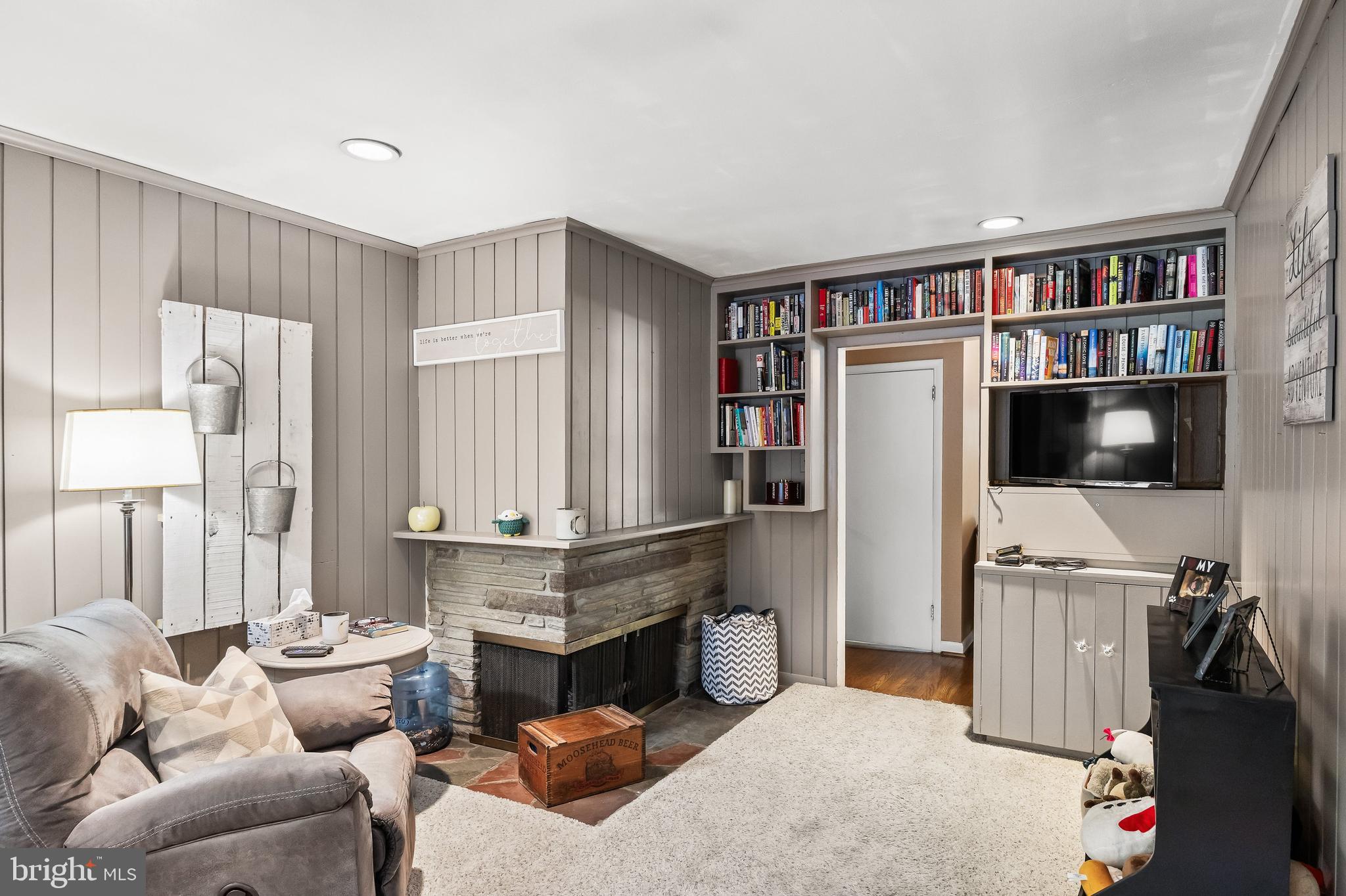 12 Greenvale Road Moorestown, NJ 08057 - Photo 17 of 49 a living room with furniture and a flat screen tv