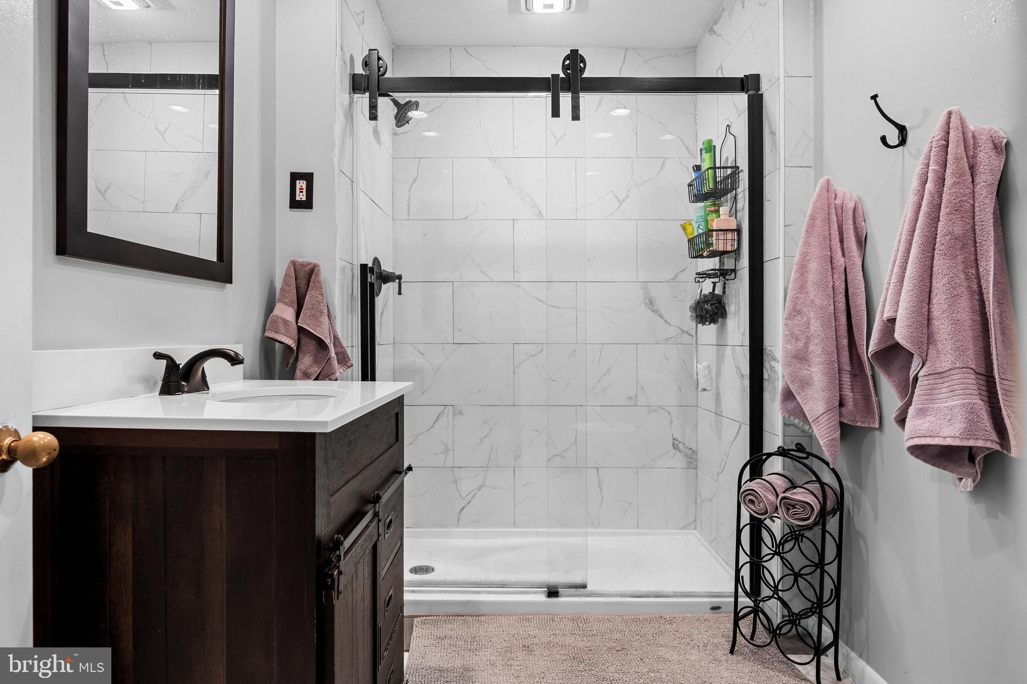 12 Greenvale Road Moorestown, NJ 08057 - Photo 19 of 49 a bathroom with a sink and a bathtub