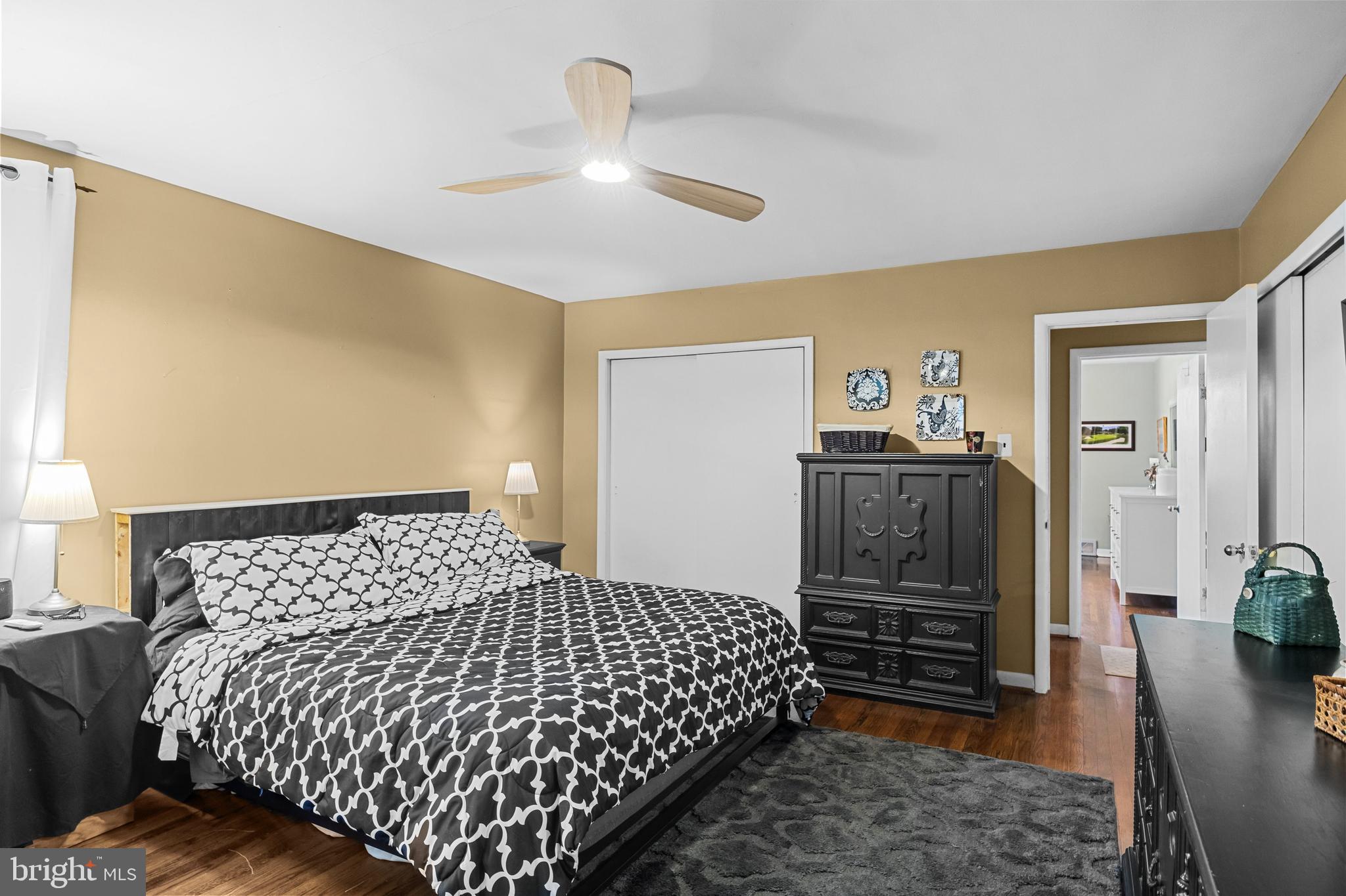 12 Greenvale Road Moorestown, NJ 08057 - Photo 22 of 49 a bedroom with a bed and wooden floor