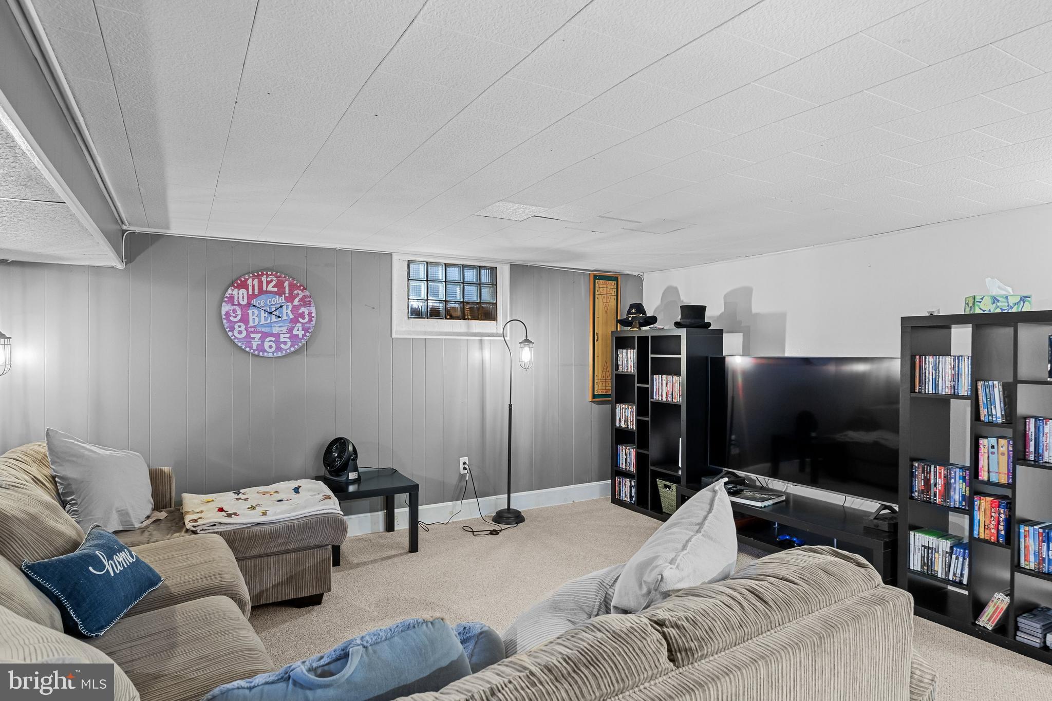 12 Greenvale Road Moorestown, NJ 08057 - Photo 26 of 49 a living room with furniture and a flat screen tv
