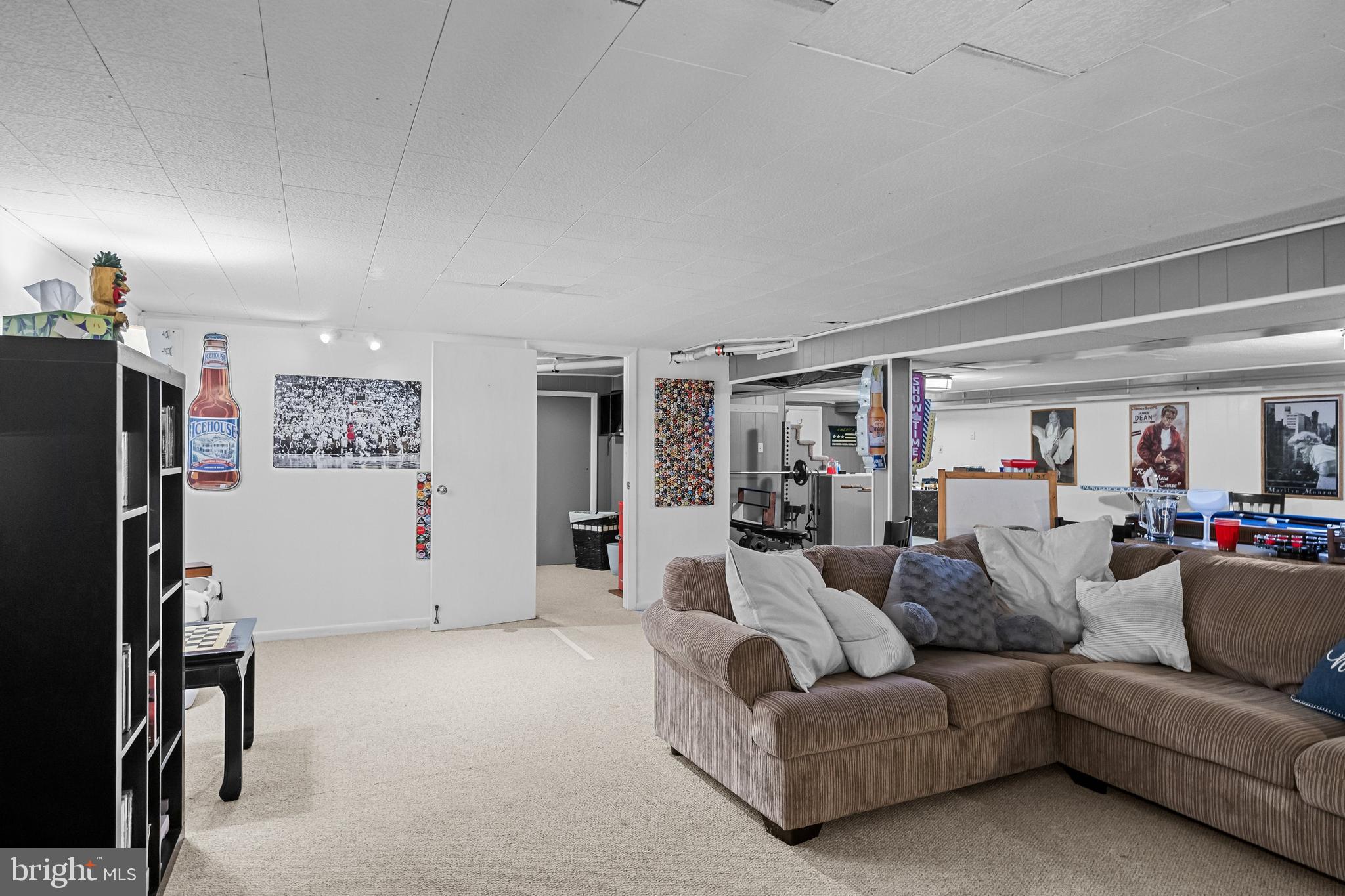 12 Greenvale Road Moorestown, NJ 08057 - Photo 27 of 49 a living room with furniture and a flat screen tv