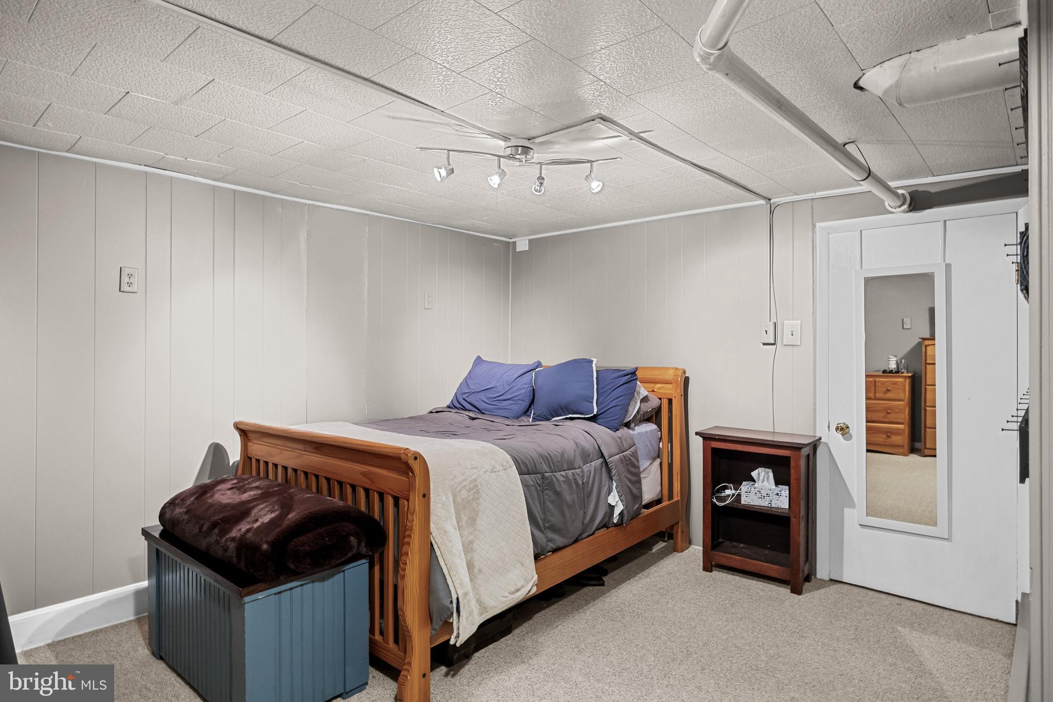 12 Greenvale Road Moorestown, NJ 08057 - Photo 28 of 49 a bed room with a bed and a dresser